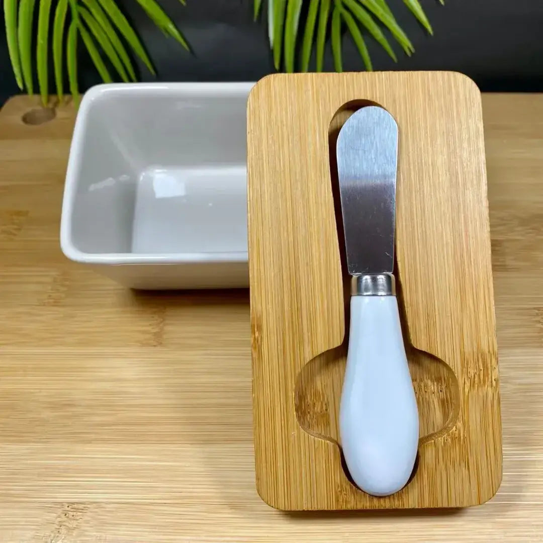 Mantegueira de cerâmica com tampa elegante para a cozinha.