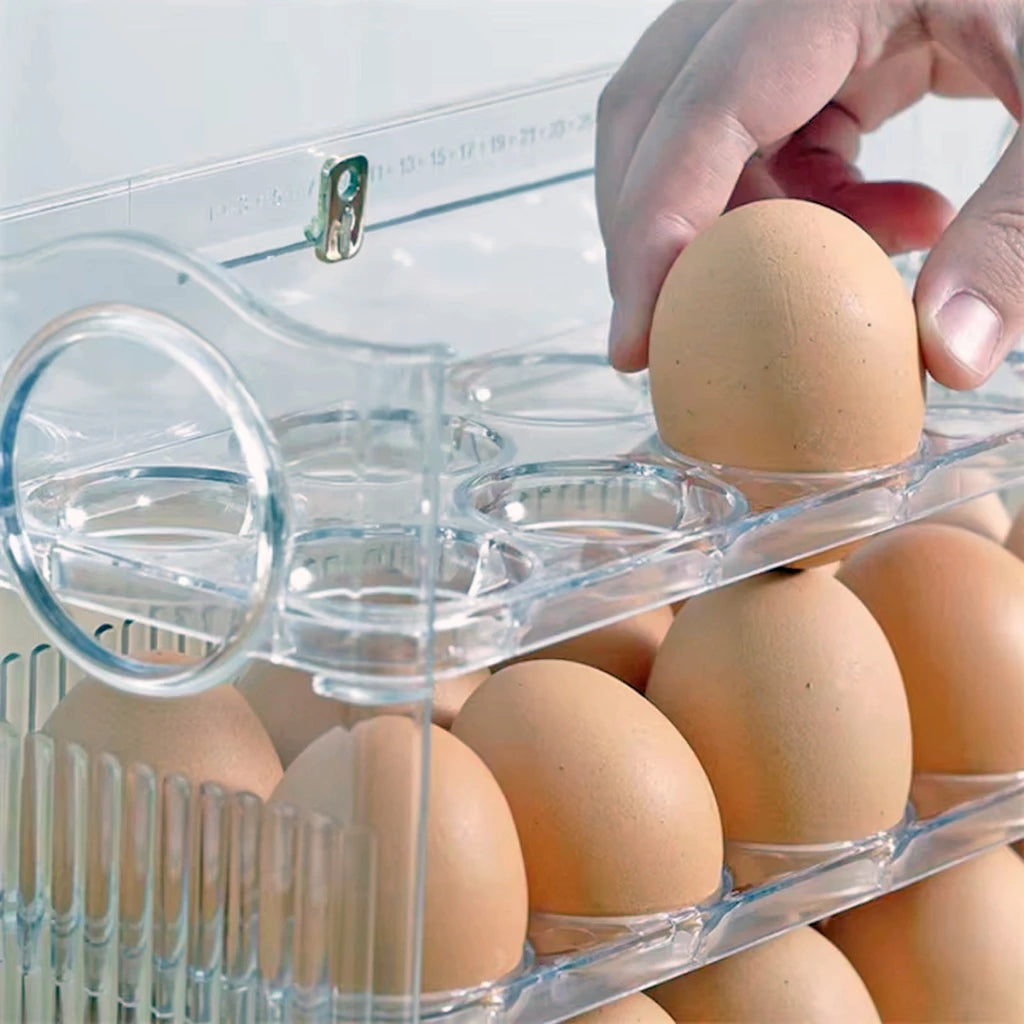 Bandeja de ovos com prateleiras basculantes que se elevam automaticamente para facilitar o alcance dos ovos na camada inferior.