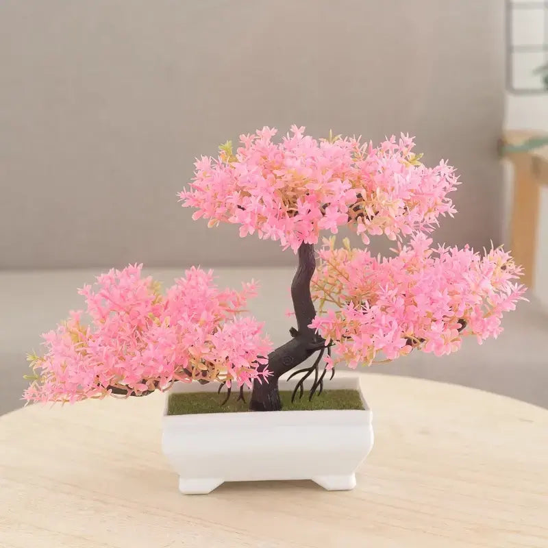 Bonsai artificial de seda, adicionando um toque de natureza à decoração.