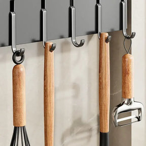 Suporte de utensílios de cozinha com design moderno, proporcionando organização prática e funcional.